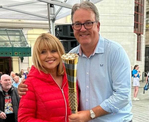 Image of Christine Talbot and Duncan Wood reuniting for Baton of Hope suicide prevention. Featured with the Baton during the Sheffield leg of Baton of Hope's inaugural tour
